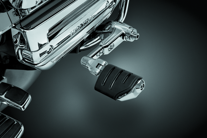 Kuryakyn Ergo III adjustable cruise mount with Trident Dually ISO pegs on Honda Gold Wing motorcycle handlebar.