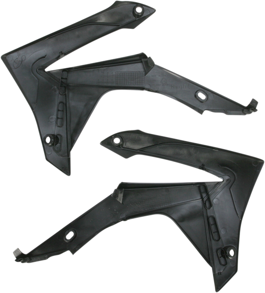Black ACERBIS radiator shrouds for motorcycle body, with visible mounting points and sleek black finish.
