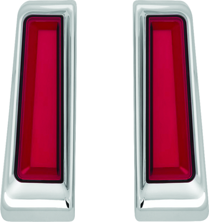 Kuryakyn Tracer LED inserts for Harley Davidson saddlebag supports, featuring chrome finish and enhanced red auxiliary lighting.