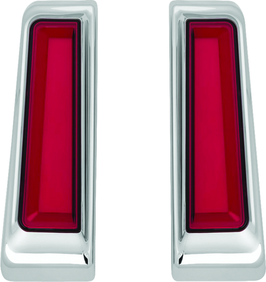 Kuryakyn Tracer LED inserts for Harley Davidson saddlebag supports, featuring chrome finish and enhanced red auxiliary lighting.