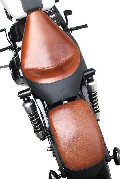 Bill's Exhausts SADDLEMEN Lariat Pad 7-inch seat with leather cover and decorative stitching, designed for comfort and style.