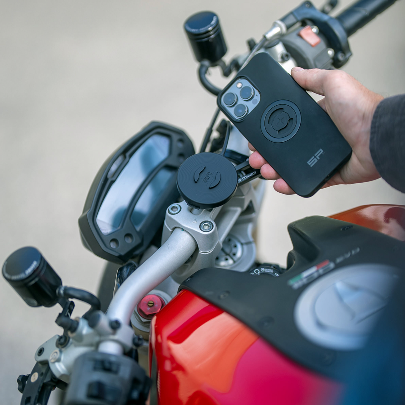 Bill's Exhausts SP CONNECT Wireless Charging Module for phones, showing the compact SPC+ 52807 charger with sleek design.