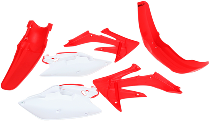 A close-up of the Acerbis Standard Replacement Body Kit for motorcycles, showing the OEM body panels in a natural setting.