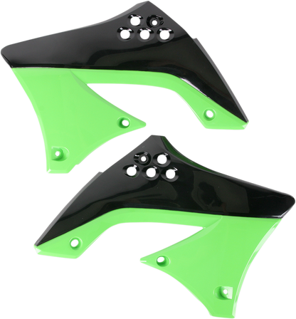 A black and green ACERBIS radiator shroud for motorcycle body protection, featuring bold color accents and sleek design.