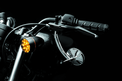 Black Kuryakyn Kinetic grips for powersports vehicles, featuring ergonomic design and textured surface for enhanced grip.