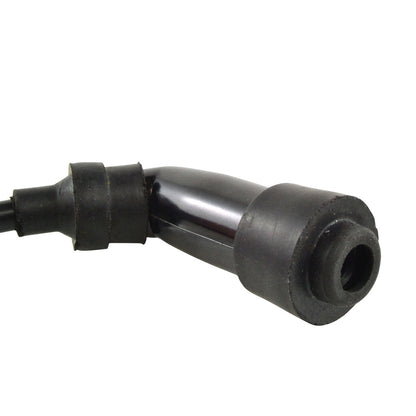 RM STATOR external ignition coil with spark plug cap, used in motorcycle ignition systems, shown in the image.
