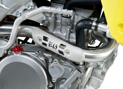 YOSHIMURA RS-4 exhaust header and canister with stainless steel and carbon fiber end cap, showing polished metal and sleek design
