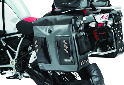 Kuryakyn Torke 24L dry bag panniers for waterproof PowerSports storage, shown mounted on a motorcycle.
