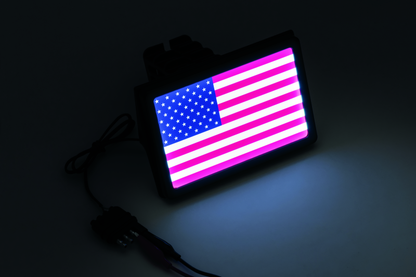 Kuryakyn Freedom Flag LED hitch cover in black for 1-1/4 inch and 2 inch receiver hitches, featuring LED illumination.