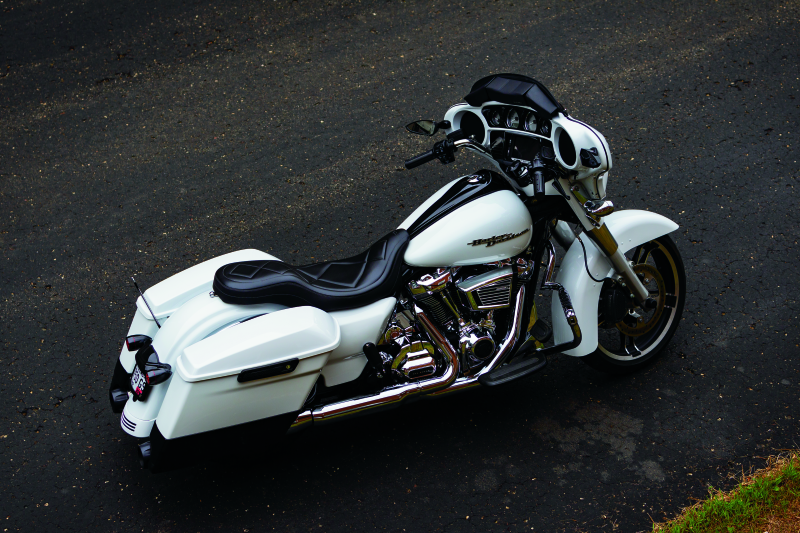 Kuryakyn Milwaukee-8 chrome starter cover for Harley-Davidson models, shiny metallic finish over engine starter area
