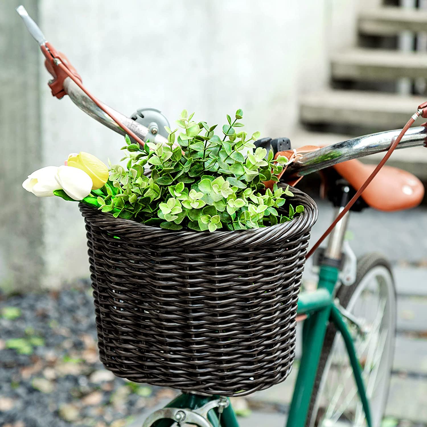 Hycline front handlebar bicycle basket attached to a bike, suitable for adults and kids, for storing small items during rides.