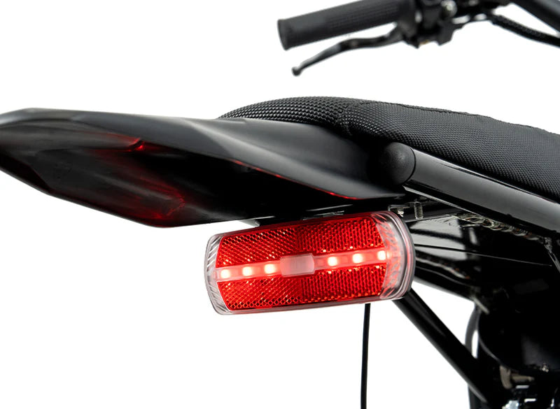Heybike Villain electric dirt bike with mid-drive motor, 45 MPH top speed, and 50-mile range, designed for off-road riding.