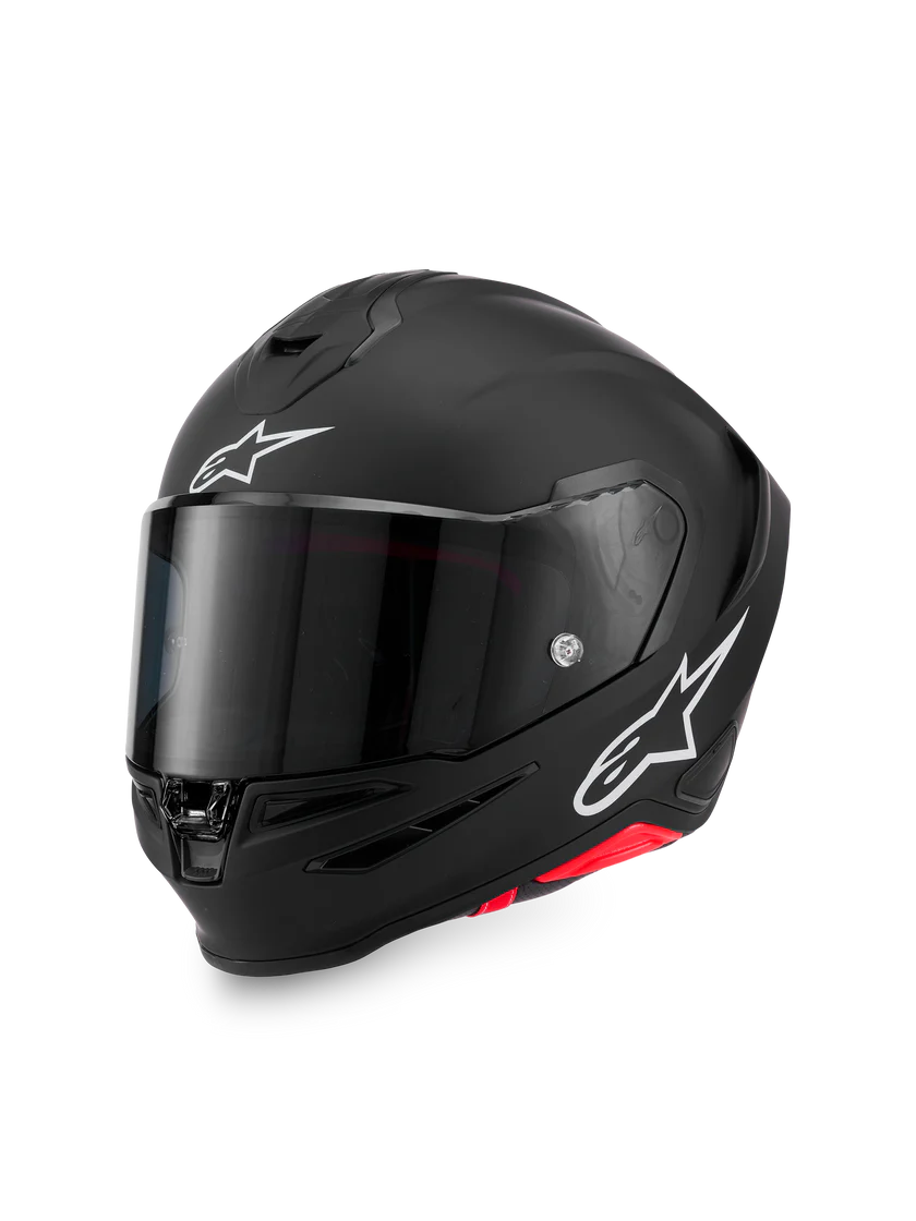 Alpinestars R7 Solid Helmet in black, showing the sleek design and safety certification labels for motorcycle riding.