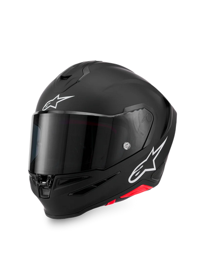 Alpinestars R7 Solid Helmet in black, showing the sleek design and safety certification labels for motorcycle riding.