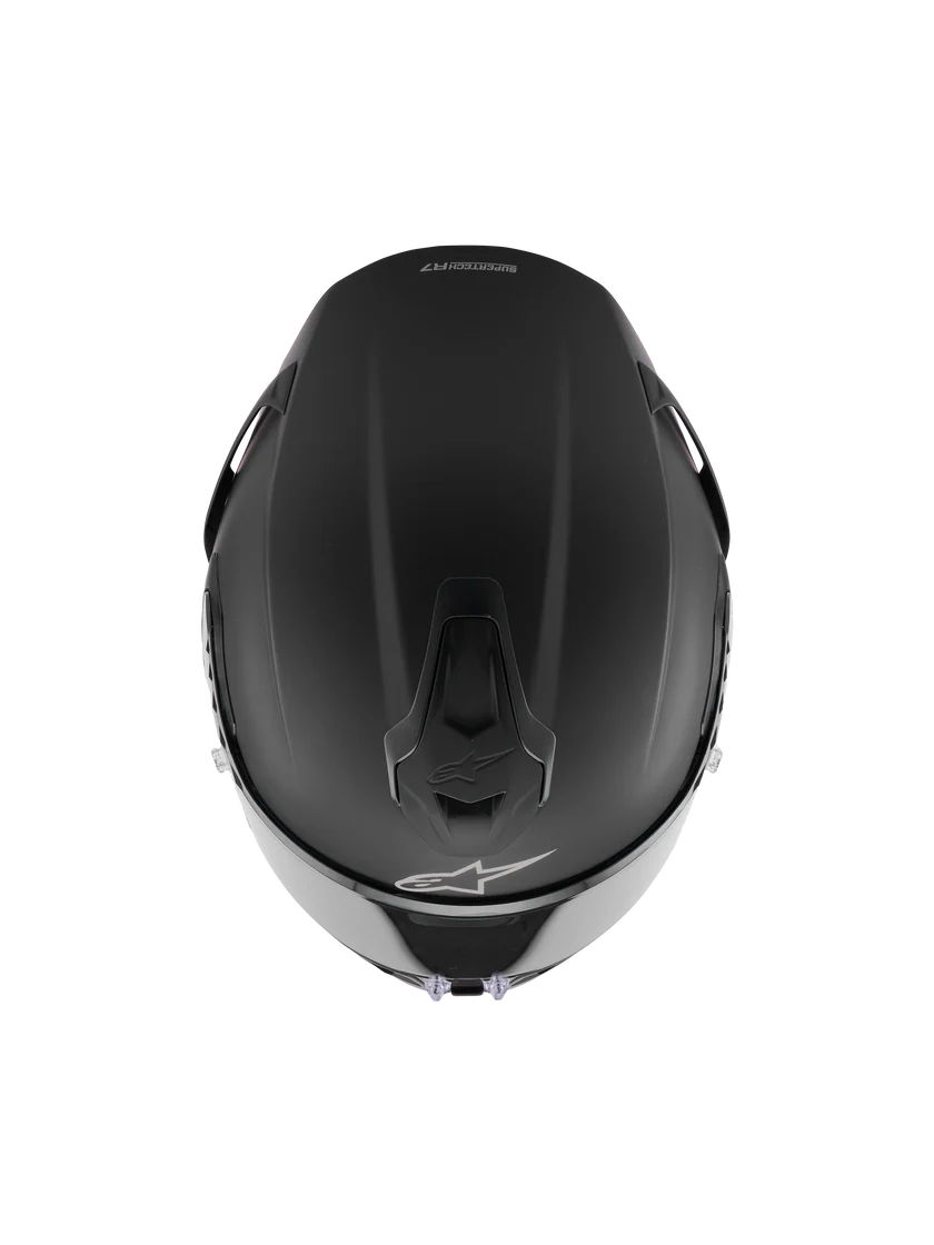 Alpinestars R7 Solid helmet with ECE 22.06 and DOT certification, featuring a sleek black design and ventilation vents.