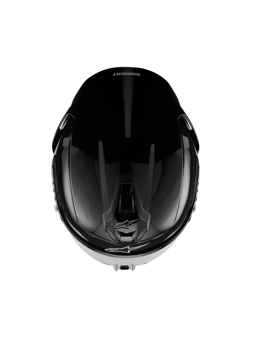 Alpinestars R7 Solid Helmet with ECE 22.06 and DOT certification, shown in black with sleek design and secure strap.