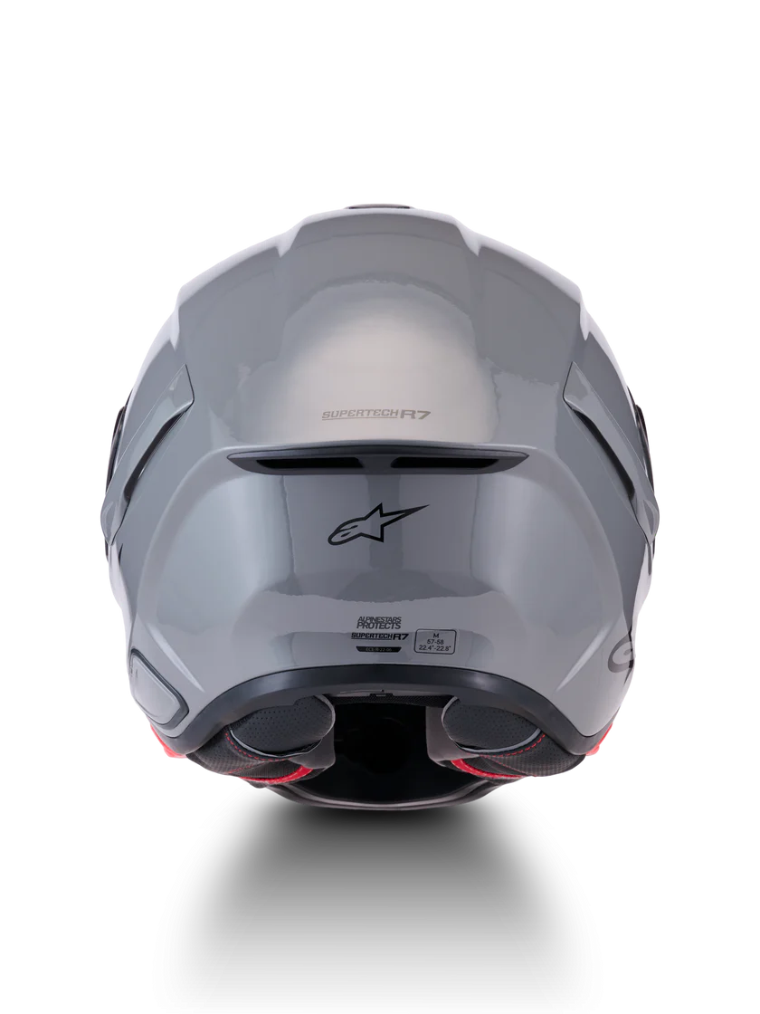 Alpinestars R7 Solid helmet with ECE 22.06 and DOT certification, shown in a sleek black design.