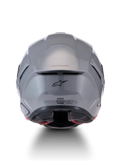 Alpinestars R7 Solid helmet with ECE 22.06 and DOT certification, shown in a sleek black design.