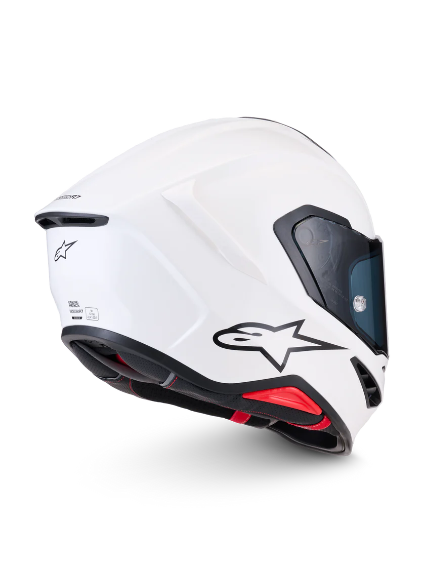 Alpinestars R7 Solid helmet with ECE 22.06 and DOT certification, showcasing a sleek black design with ventilation vents.