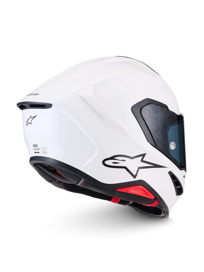 Alpinestars R7 Solid helmet with ECE 22.06 and DOT certification, showcasing a sleek black design with ventilation vents.