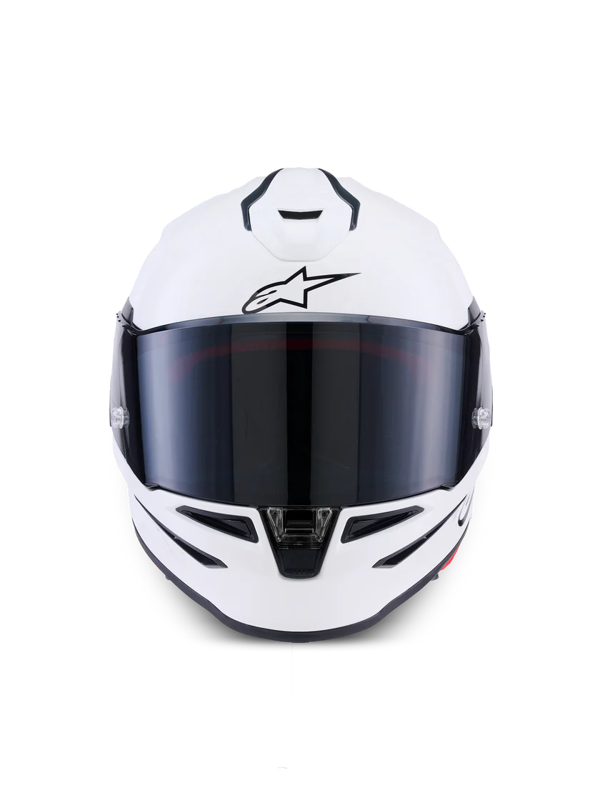 Alpinestars R7 Solid helmet with ECE 22.06 and DOT certification, shown from the front with a sleek black design.