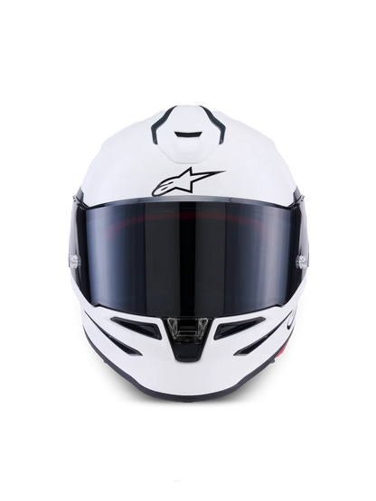 Alpinestars R7 Solid helmet with ECE 22.06 and DOT certification, shown from the front with a sleek black design.