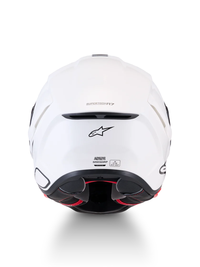 Alpinestars R7 Solid helmet with ECE 22.06 and DOT certification, shown in black with a sleek aerodynamic design.