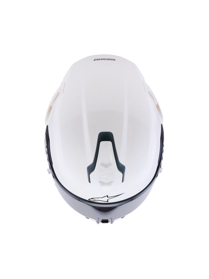 Alpinestars R7 Solid helmet with ECE 22.06 and DOT certification, showing a sleek black motorcycle helmet with ventilation vents.