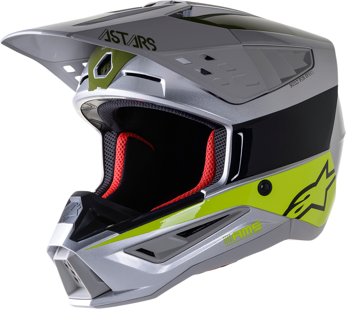 Alpinestars SM5 motorcycle helmet in silver, yellow, and green, size medium, with sleek aerodynamic design.