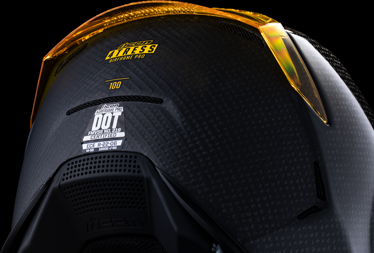 Yellow ICON Airframe Pro™ motorcycle helmet with carbon shell and XS size, featuring aerodynamic design and clear visor.
