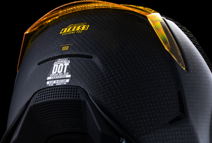 Yellow ICON Airframe Pro™ helmet with carbon shell, large size, featuring sleek aerodynamic design and ventilation.
