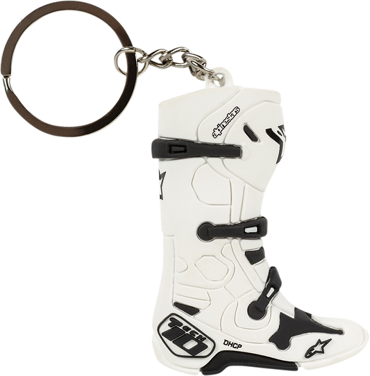 Alpinestars Tech 10 Boot key fob in white, featuring detailed design and branding, used as a protective gear accessory.