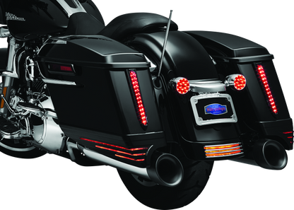 Kuryakyn chrome rear fender accents for Harley Davidson FLHX and FLTR models, adding stylish detail to motorcycle fenders.