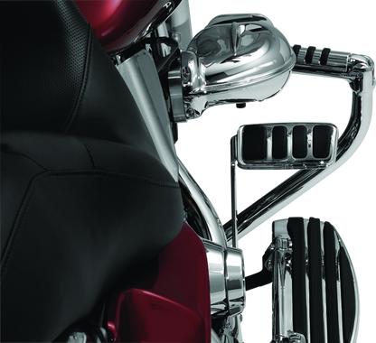 Kuryakyn ISO Brake Pedal Pad Longhorn Chrome for Harley Davidson Touring motorcycle, showing shiny chrome finish and detailed design.