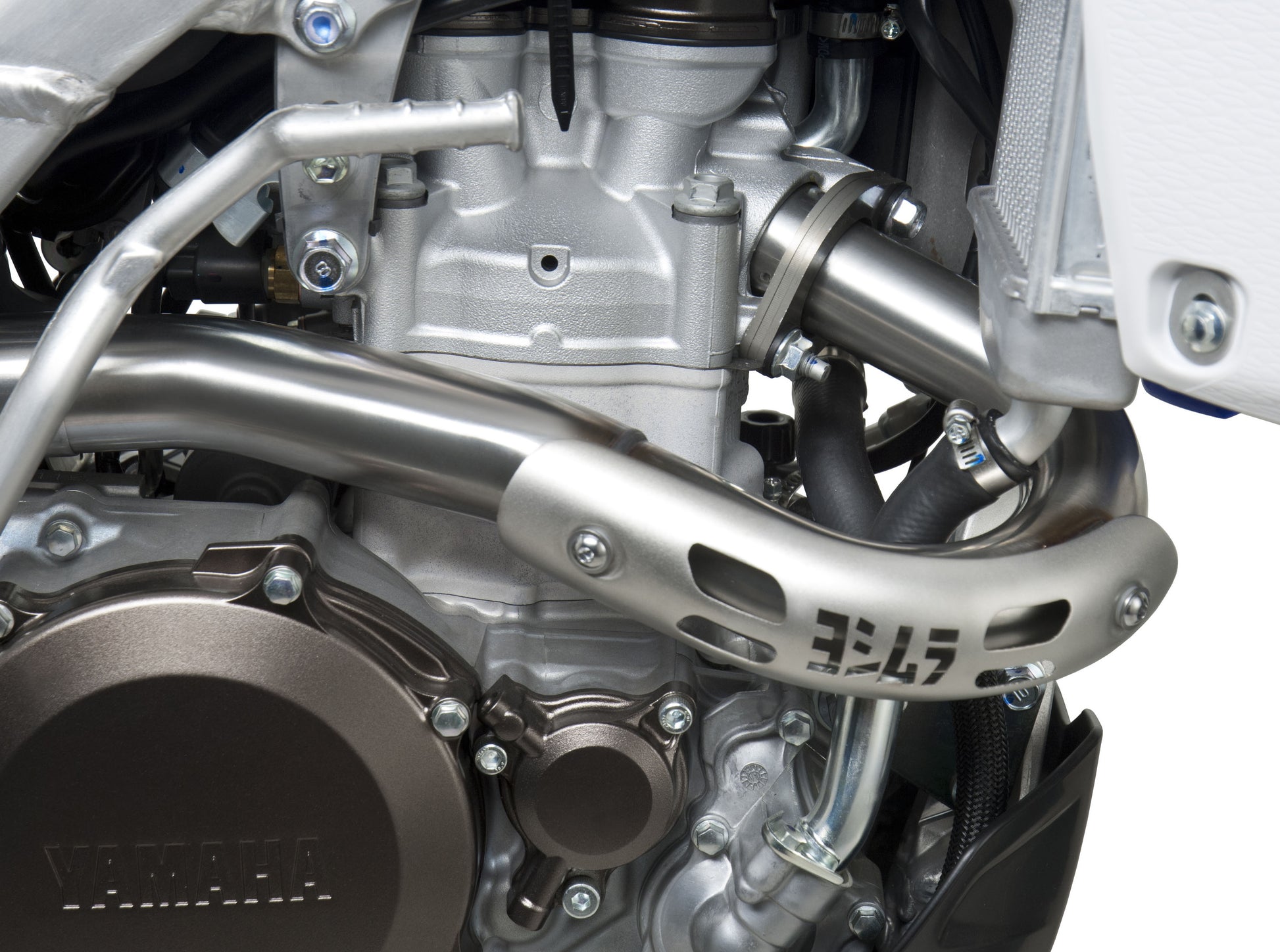 YOSHIMURA RS-4 motorcycle header and exhaust system with polished metal pipes and muffler, designed for performance and durability.