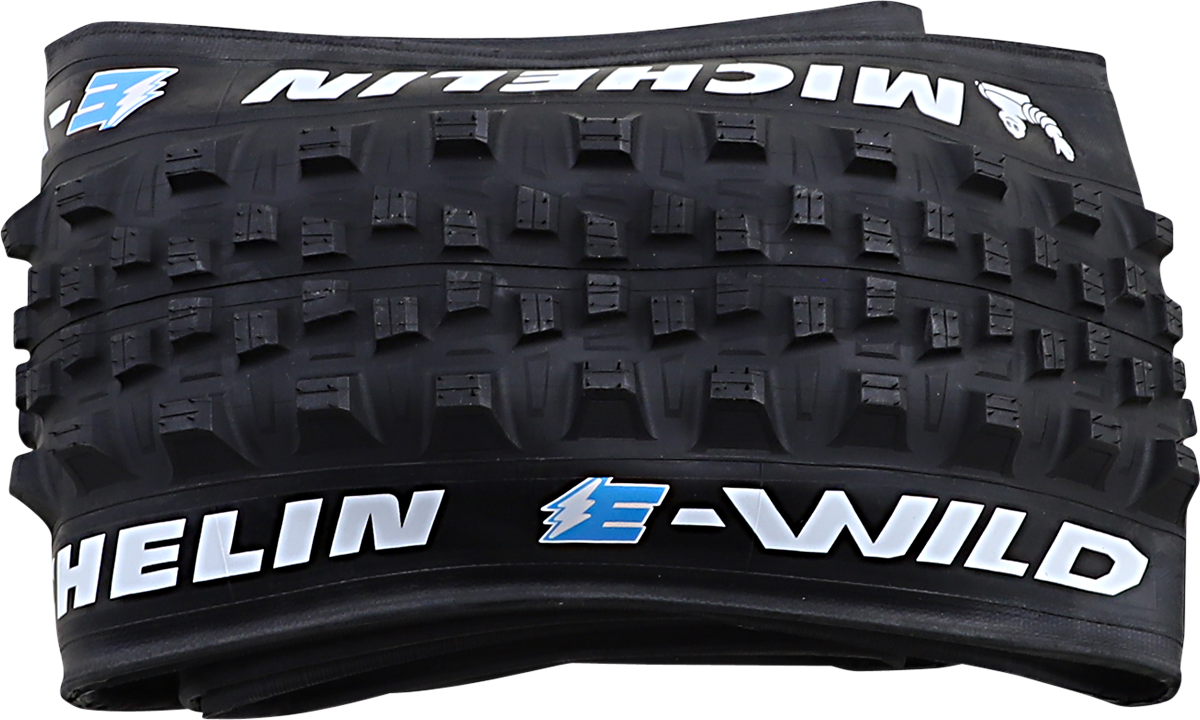 Michelin E-Wild front tire for e-bikes, 27.5 x 2.80, with rugged tread pattern and durable rubber for off-road biking.