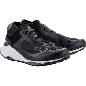 Alpinestars Meta XR v2 motorcycle shoes in black, white, and dark gray, US size 10.5, featuring protective design and sporty style.