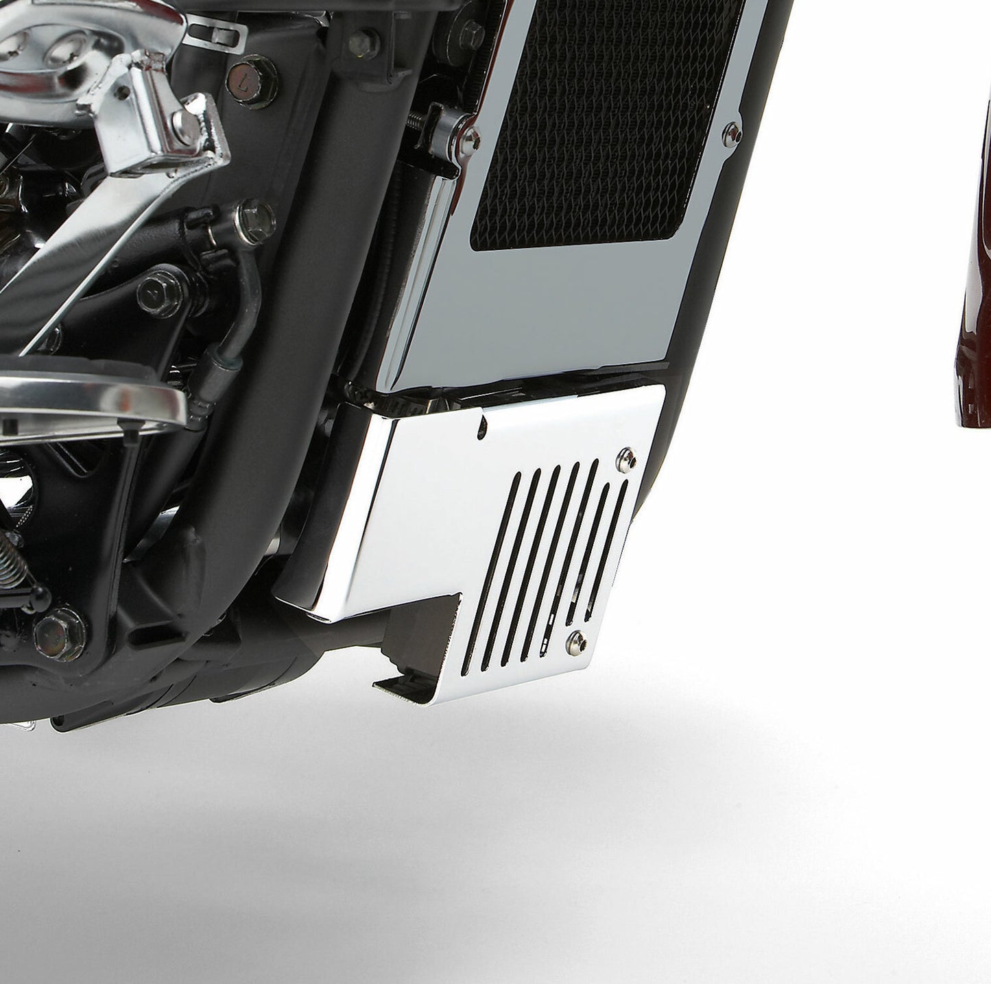Chrome COBRA regulator cover for Kawasaki Vulcan Vn900, part 05-9349, showcasing the shiny, protective accessory on the motorcycle.