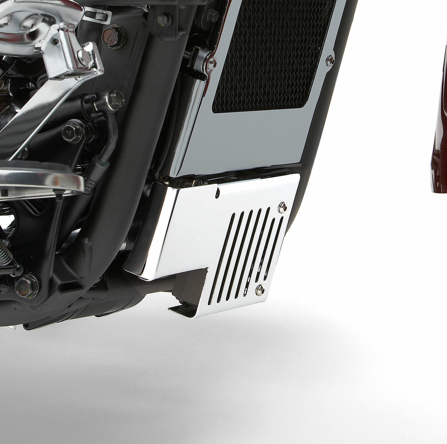 Chrome COBRA regulator cover for Kawasaki Vulcan Vn900, part 05-9349, showcasing the shiny, protective accessory on the motorcycle.