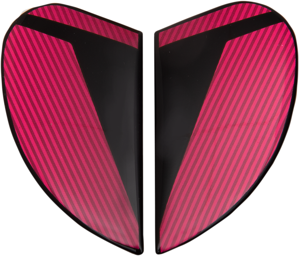Pink ICON Airform™ Side Plates for Conflux helmet, motorcycle helmet parts, with detailed pink and black design accents.
