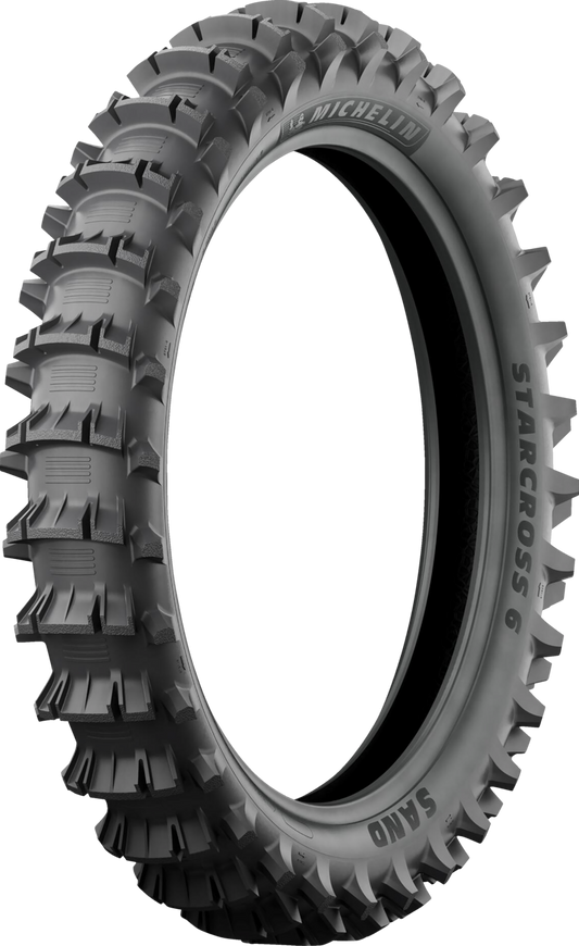 Michelin StarCross 6 Sand rear motorcycle tire, 110/90-19 size, featuring rugged tread for off-road traction.