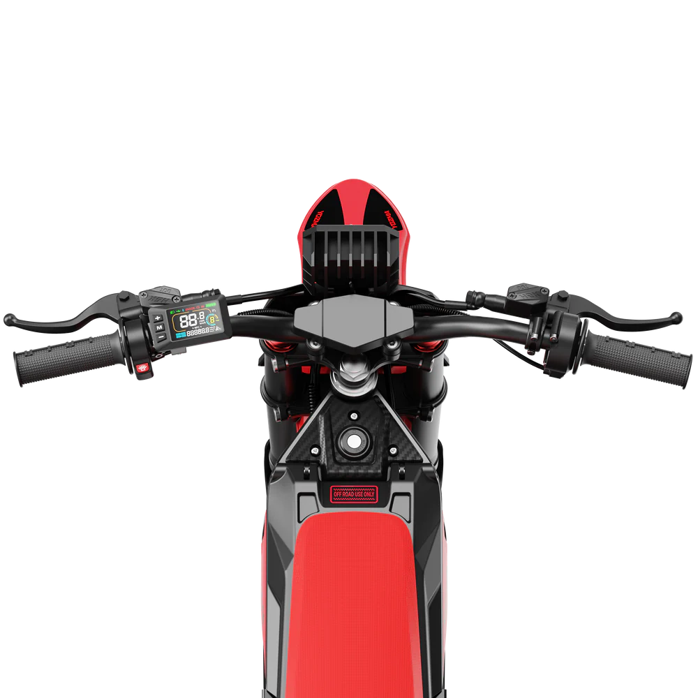 Yozma IN 10 electric mini dirt bike for kids, 2600W e-moto with black and red frame, ready for off-road adventure.