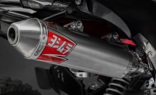 YOSHIMURA Signature RS 2 full system exhaust for UTVs, featuring a sleek metallic finish and compact design.