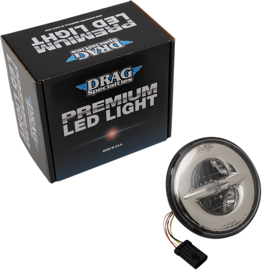 Chrome 7-inch reflector-style LED headlamp by Drag Specialties with bright, energy-efficient lighting for motorcycle use.