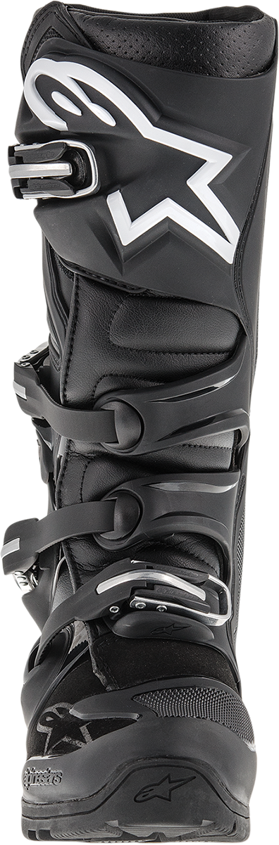 Alpinestars Tech 7 Enduro boots in black with sturdy design, buckles, and high ankle support for off-road riding.