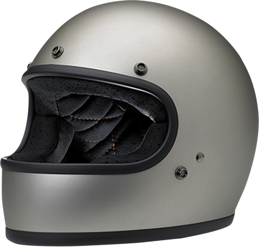 BILTWELL Gringo helmet in flat titanium finish, XS size, featuring a sleek motorcycle helmet design with smooth surface and secure strap