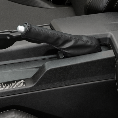 Black stitched SHOW CHROME cover for E-brake on Slingshot engine, designed by Bill's Exhausts.