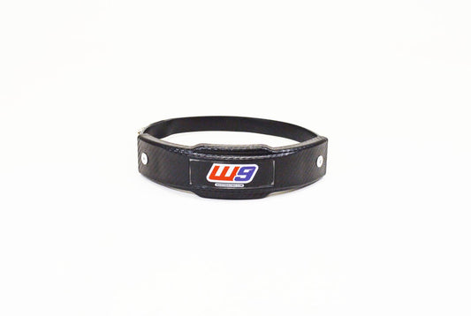 Warp 9 Universal Exhaust Sliders in black for motorcycle exhaust protection, durable design by Warp9Racing.
