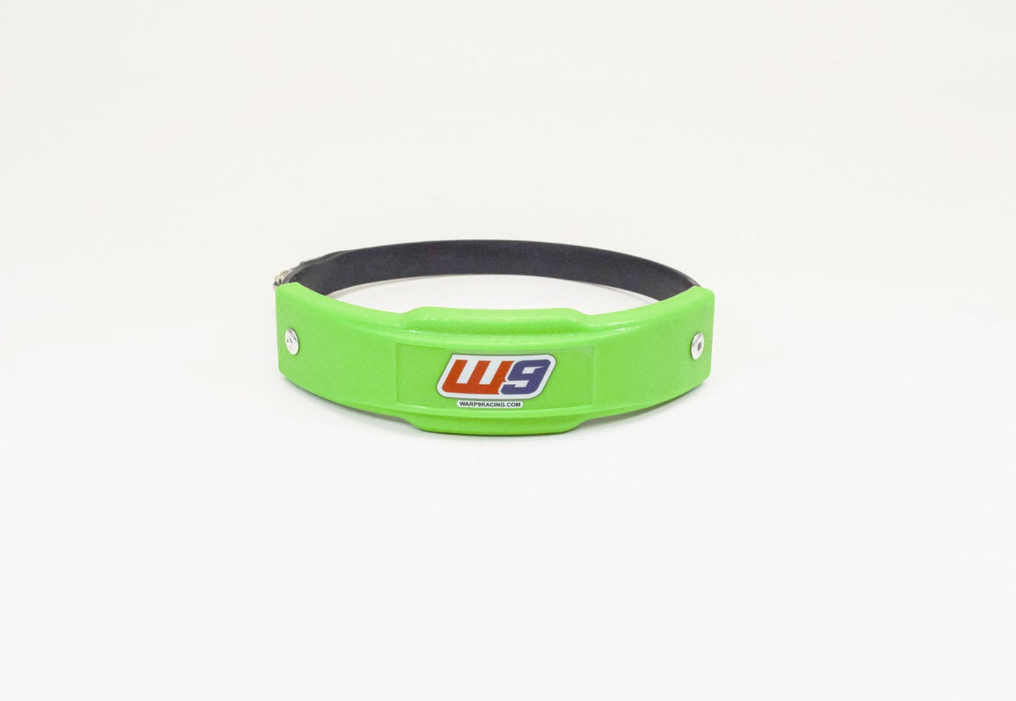 Green Warp 9 Universal Exhaust Slider for motorcycle exhaust protection, designed to prevent damage and enhance ride safety.