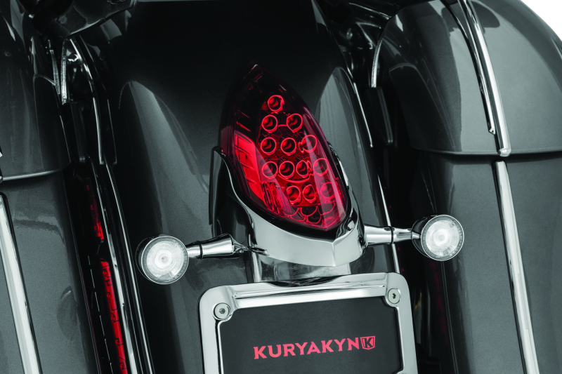 Kuryakyn custom rear turn signal and license plate mount for Indian motorcycles, black metal with integrated signal lights.